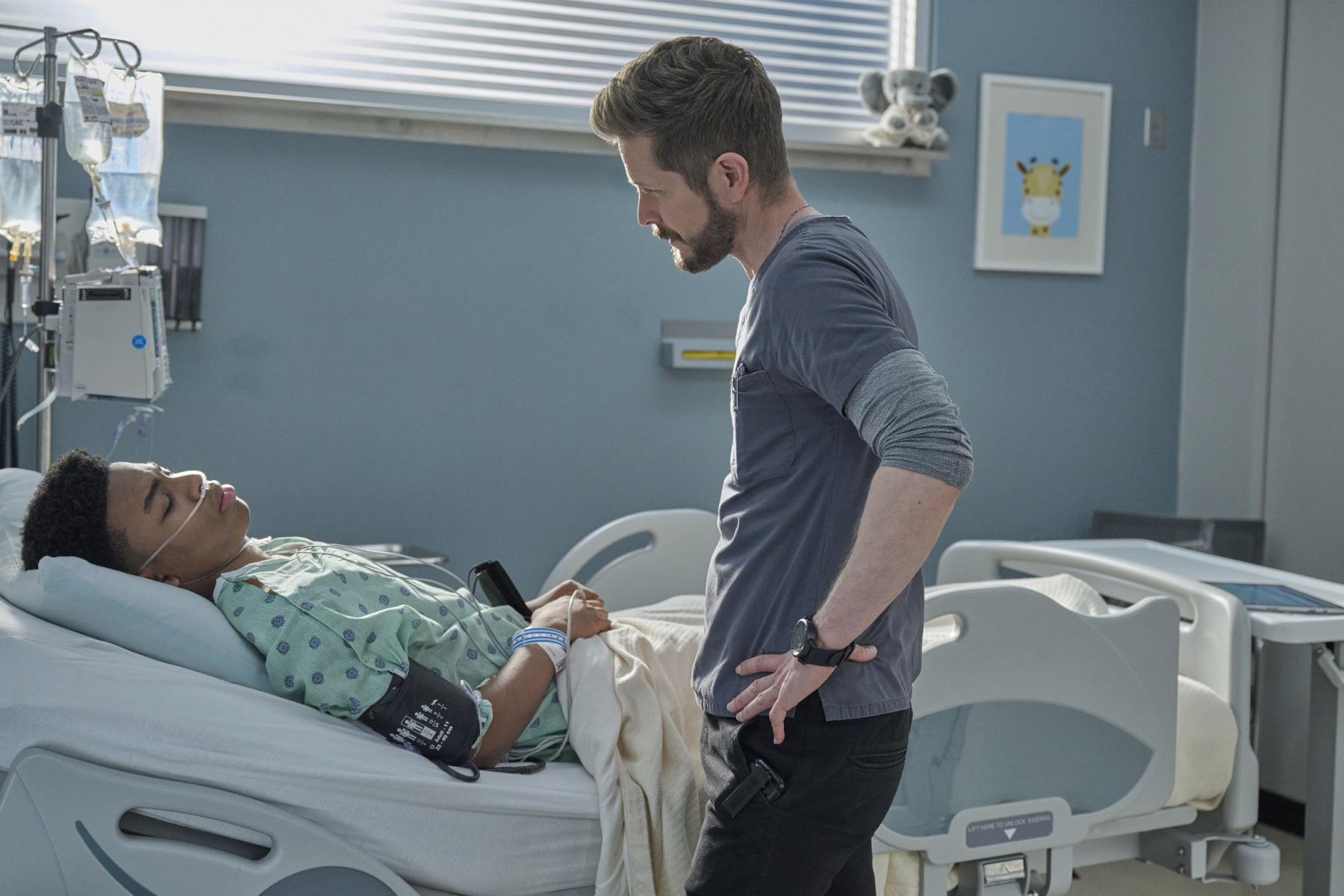 THE RESIDENT:  L-R: Guest star Noah Stone and Matt Czuchry in the “Better Part of Valor” episode of THE RESIDENT airing Tuesday, Nov. 15 (8:00-9:02 PM ET/PT) on FOX. ©2022 Fox Media LLC. CR: Tom Griscom/FOX