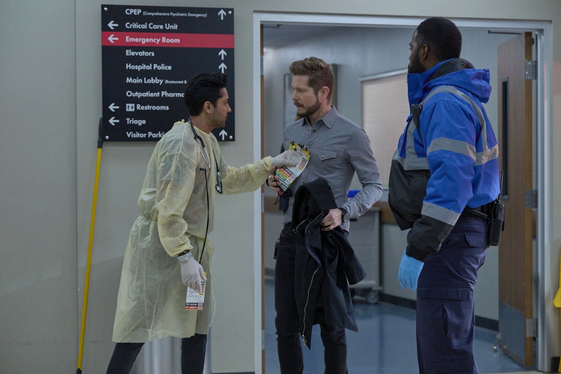 THE RESIDENT: L-R: Manish Dayal, Matt Czuchry and guest star Rabon Hutcherson in the "All The Wiser" episode of THE RESIDENT airing Tuesday, Jan 10 (8:00-9:00 PM ET/PT) on FOX. ©2022 Fox Media LLC. CR: Tom Griscom/FOX